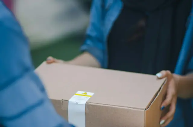 Parcel being handed over at the door